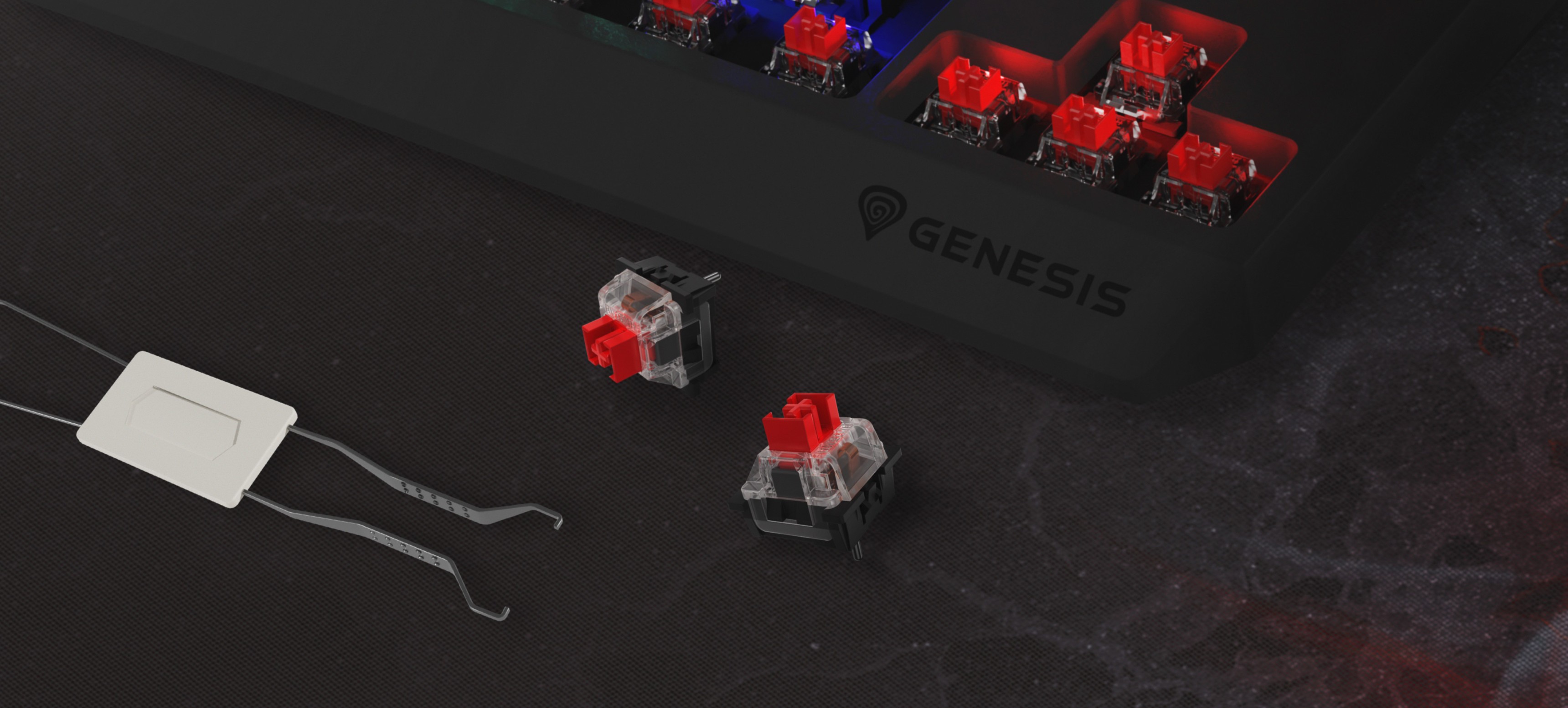 Detail herní klávesnice Genesis Thor 230 TKL Lite s červenými mechanickými spínači Outemu a nástrojem na stahování spínačů